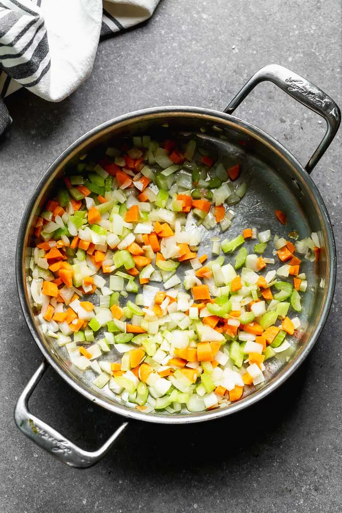 Saute carrots, onion, celery and garlic