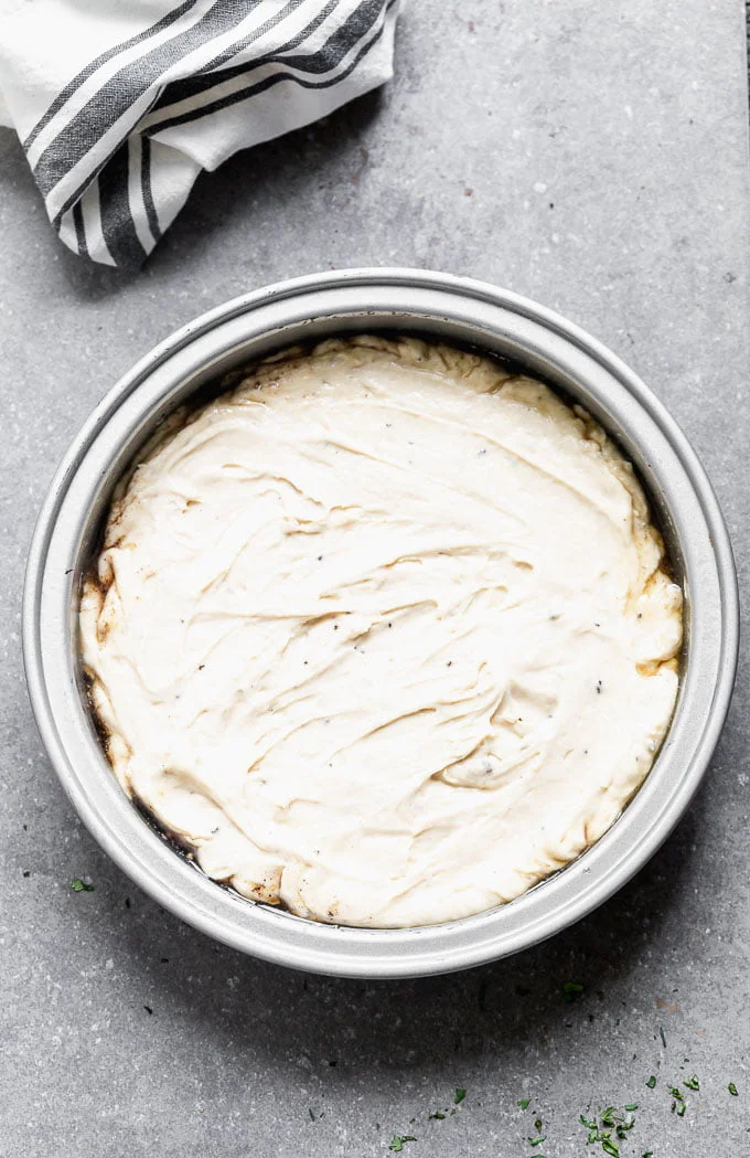 Spread the cake batter over the pears.