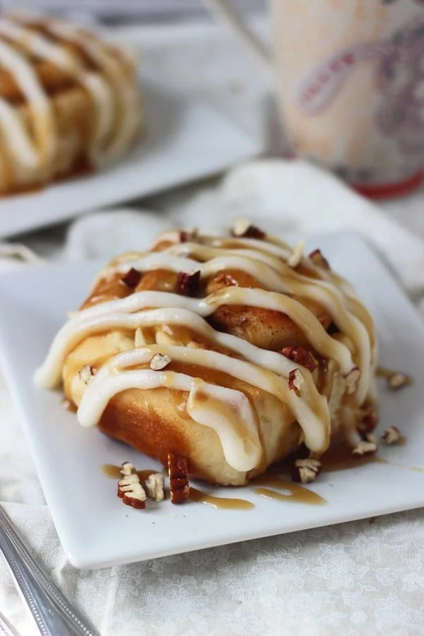 Apple Pecan Cinnamon Rolls with Cream Cheese Frosting and Caramel Sauce