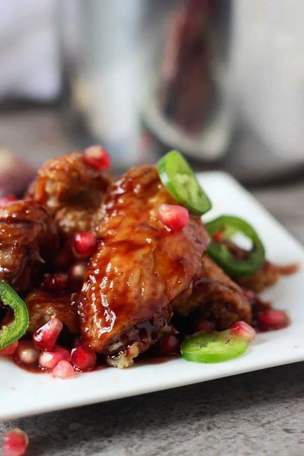 Sticky Baked Wings with Spicy Pomegranate Glaze 