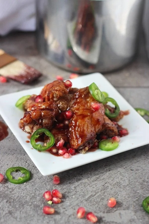 Sticky Baked Wings with Spicy Pomegranate Glaze 