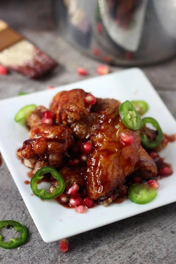 Sticky Baked Wings with Spicy Pomegranate Glaze 