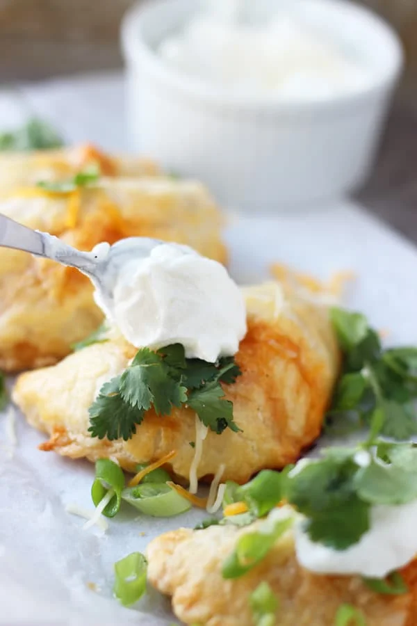 Chicken Enchilada Empanadas - All you favorite enchilada flavors stuffed into puff pastry and made portable!