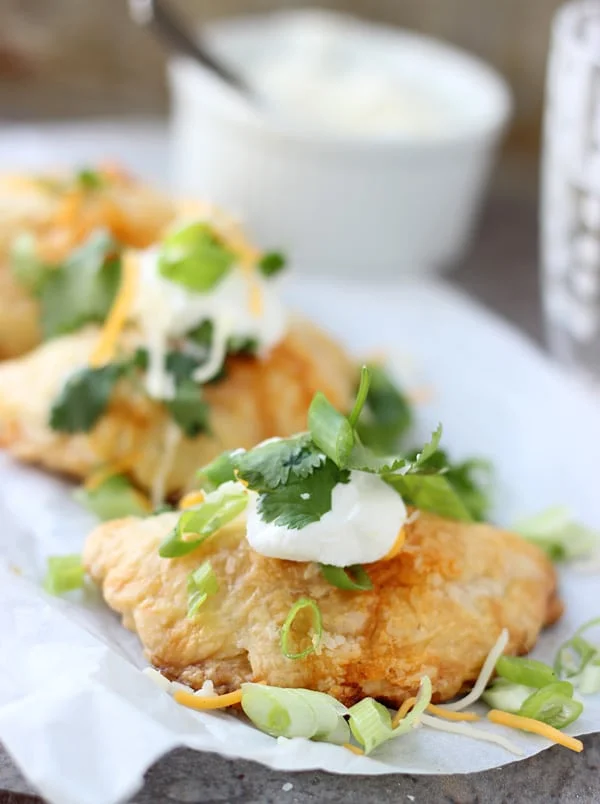 Chicken Enchilada Empanadas - All you favorite enchilada flavors stuffed into puff pastry and made portable!