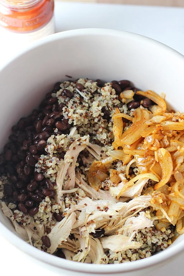 Quinoa, black beans, enchilada sauce, onions and shredded chicken