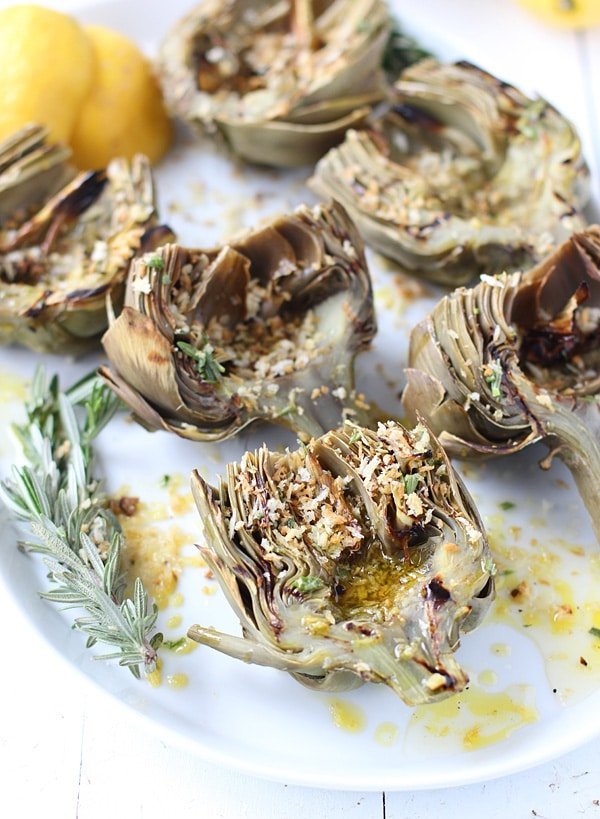 Grilled Artichokes with Garlic Breadcrumbs via cookingforkeeps.com