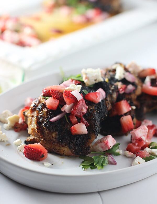 Blackened Chicken Thighs with Strawberry Feta Salsa via cookingforkeeps.com