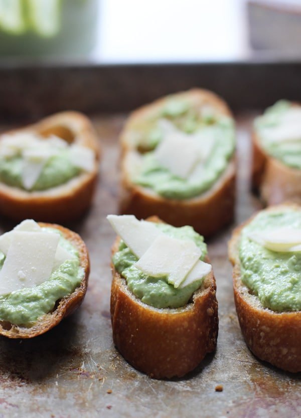 Baby Pea and Ricotta Crostini via cookingforkeeps.com