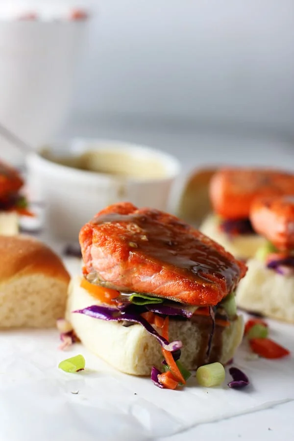 Salmon Sliders with (Epic!) Peanut Sauce and Asian Sesame Slaw via cookingforkeeps.com