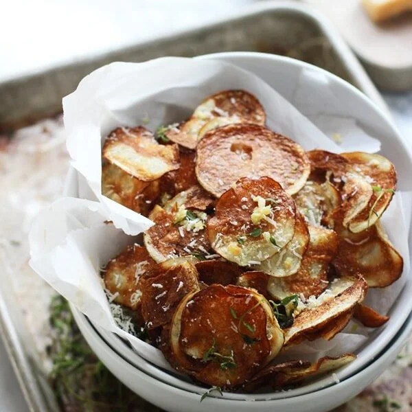 Crispy Baked Potato Chips with Garlic, Thyme and Parmesan + How to make the crispiest chips in the oven!