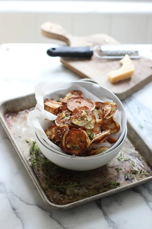 Crispy Baked Potato Chips with Garlic, Thyme and Parmesan + How to make the crispiest chips in the oven! 