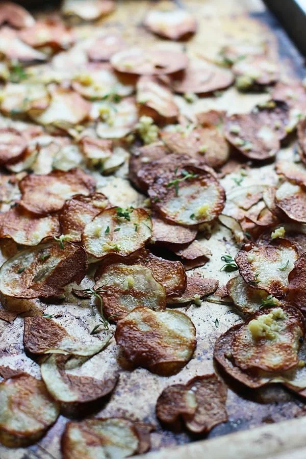 Crispy Baked Potato Chips with Garlic, Thyme and Parmesan + How to make the crispiest chips in the oven! 