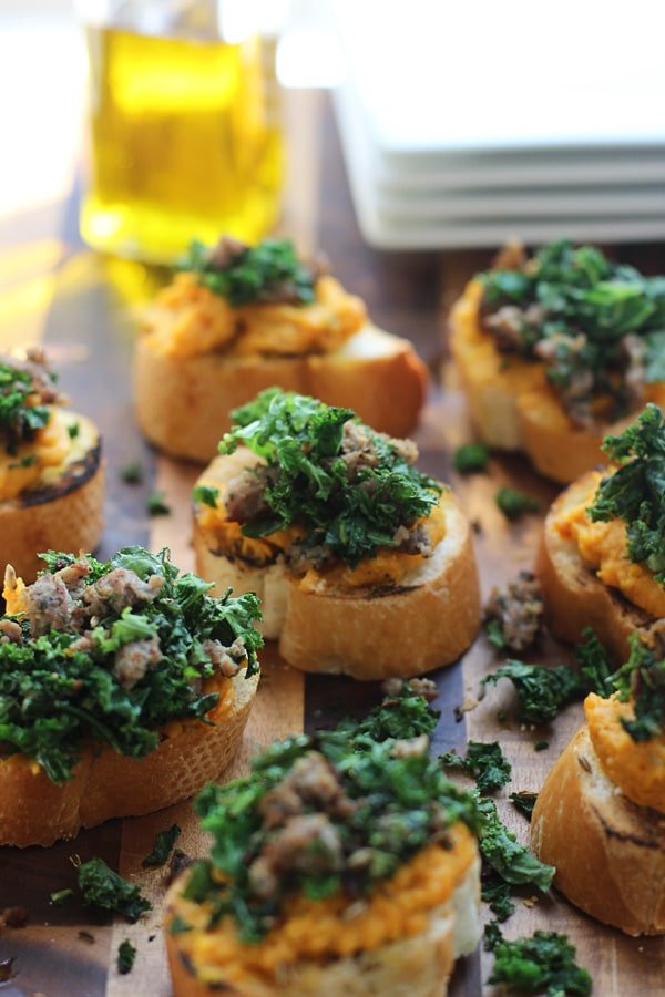 Whipped Ricotta and Butternut Squash Crostini with Sauteed Kale and Italian Sausage 