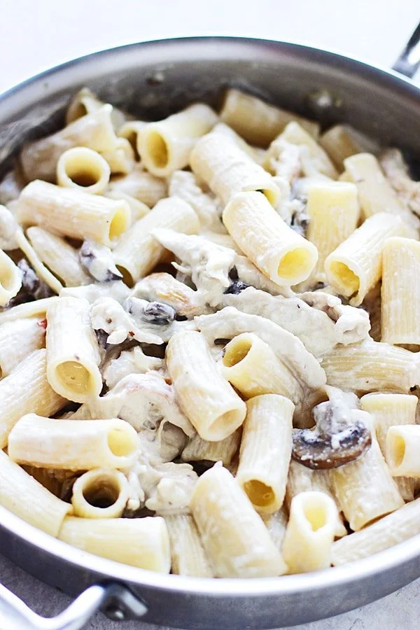 Creamy Fontina Rigatoni with Roasted Garlic, Portabellas and Pulled Chicken | cookingforkeeps.com