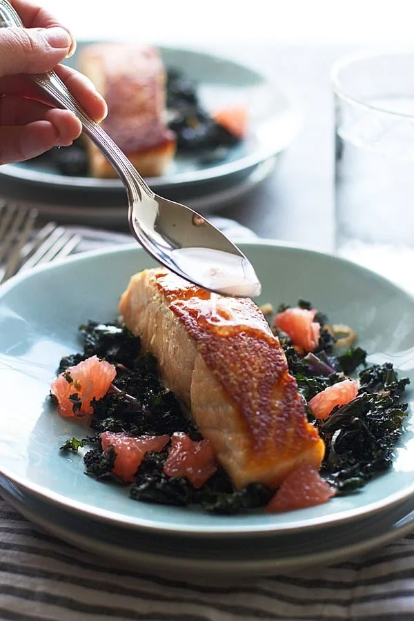 Pan-Roasted Salmon with Garlicky Kale and Citrus Vinaigrette | A simple, restaurant-quality meal at home!