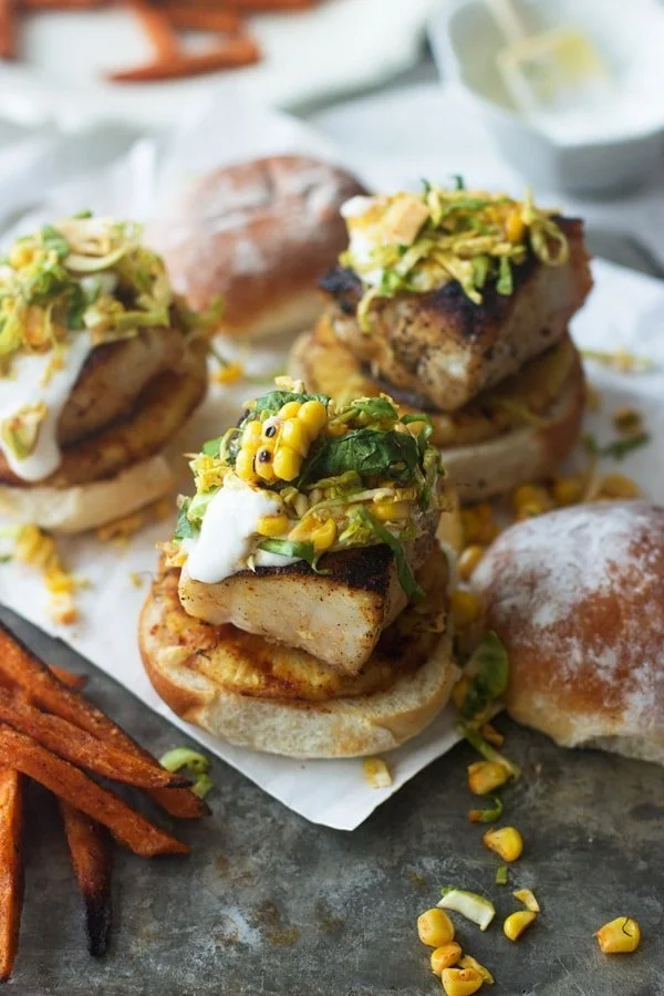 Mahi Mahi Sliders with Grilled Pineapple, Corn Brussels Sprout Slaw and Lime Sour Cream