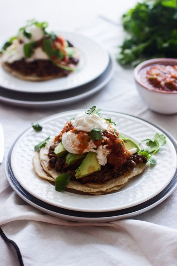 Mexican Breakfast Tostadas with Chorizo Re-fried Beans, Avocado and Poached Eggs