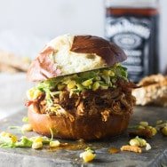 Slow-Cooker Bourbon Brown Sugar Pulled Chicken Sandwiches with Bacon and Brussels Sprout Corn Slaw