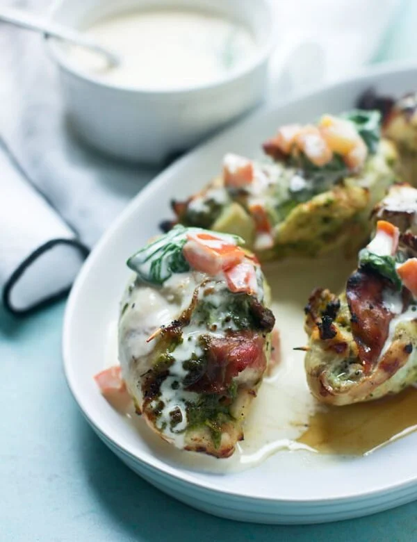 Pesto and Prosciutto Stuffed Chicken with Sherry Basil Cream Sauce