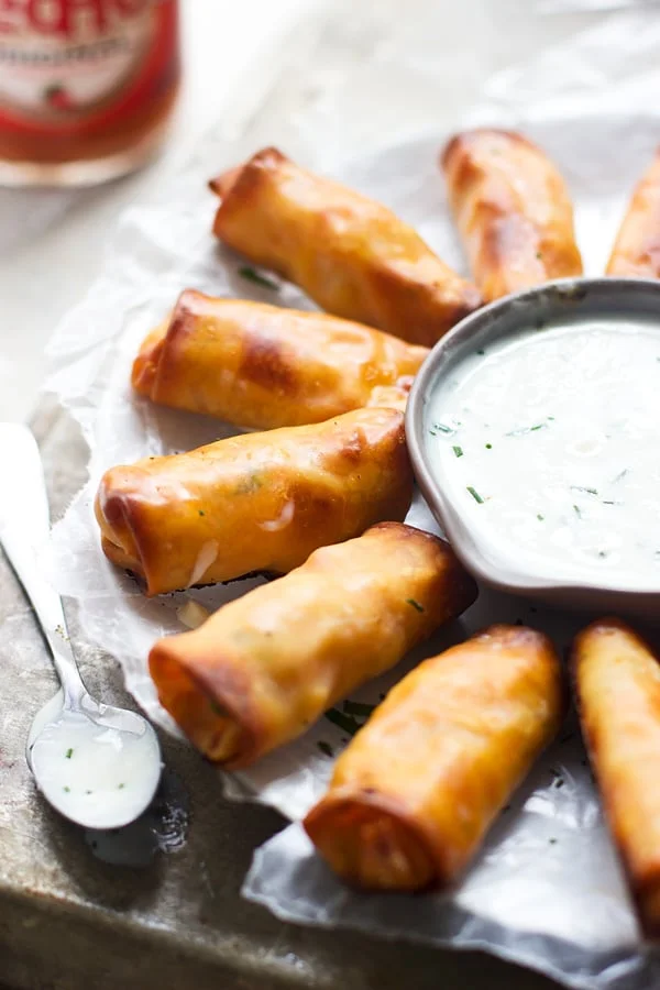 Mini Buffalo Chicken Egg Rolls with Blue Cheese Sauce