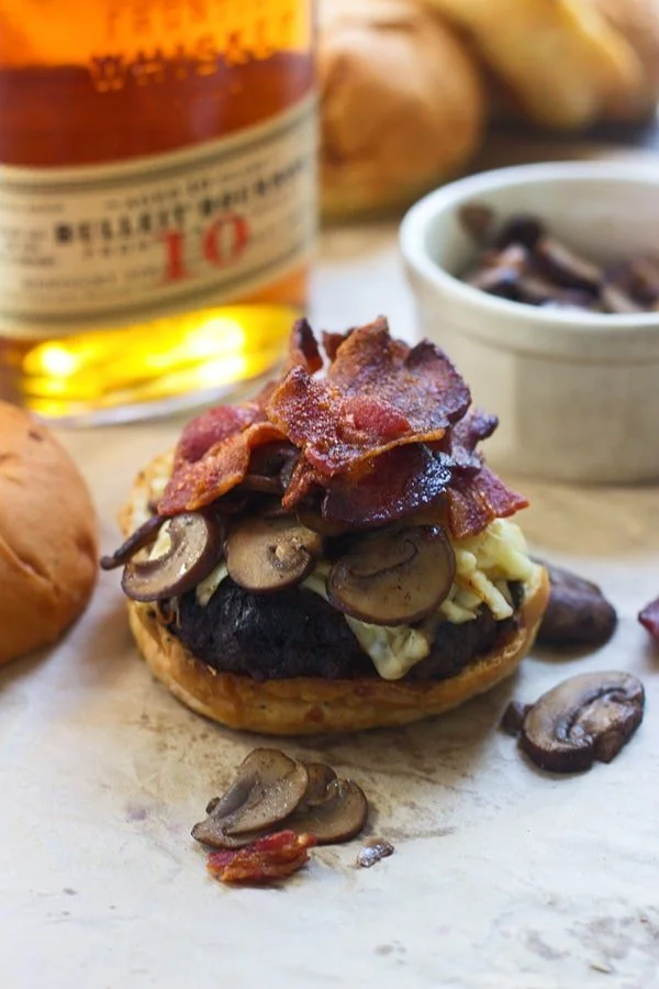 Brown Butter Seared Burgers with Bourbon Mushrooms, Bacon and Gruyere