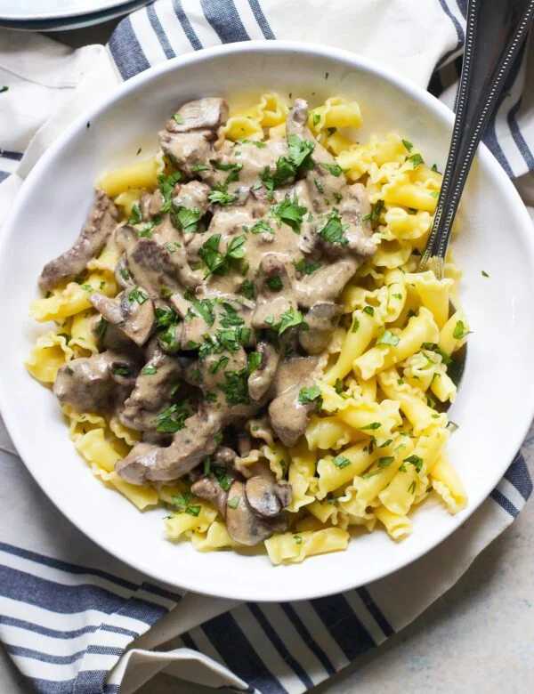Lightened-Up Beef Stroganoff - Comes together in under 30 minutes and is every bit as delicious as the original!