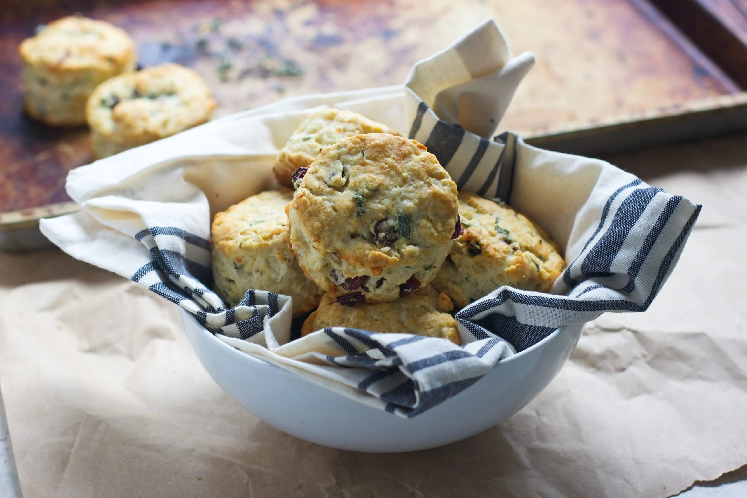 Super Easy Gruyere, Cranberrya and Sage Buttermilk Biscuits - The perfect alternative to rolls on your holiday table!