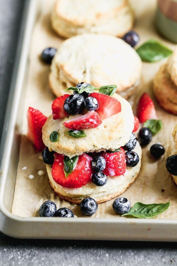 Once you try our Lemon Strawberry Shortcakes with Warm Sweet Cream, you may never be able to eat another dessert again. We take super-soft lemon and basil shortcakes, fill them with macerated berries, and then drown them in warm sweetened cream. Heaven on earth.&nbsp;