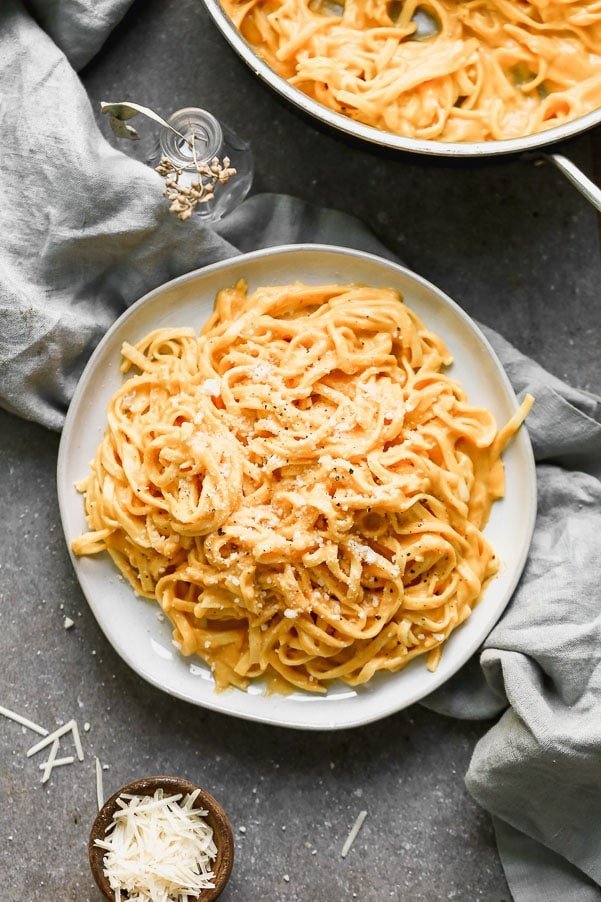 This Roasted Butternut Squash Pasta (5 Ingredients!)&nbsp;is creamy, cheesy, and SO delicious. Packed with roasted butternut squash, plenty of parmesan cheese, and just a touch of cream, this is an easy dinner you'll come back to time and time again this fall!&nbsp;