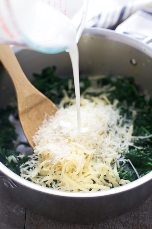 Add in cream, fontina and parmesan cheese. Stir to combine.