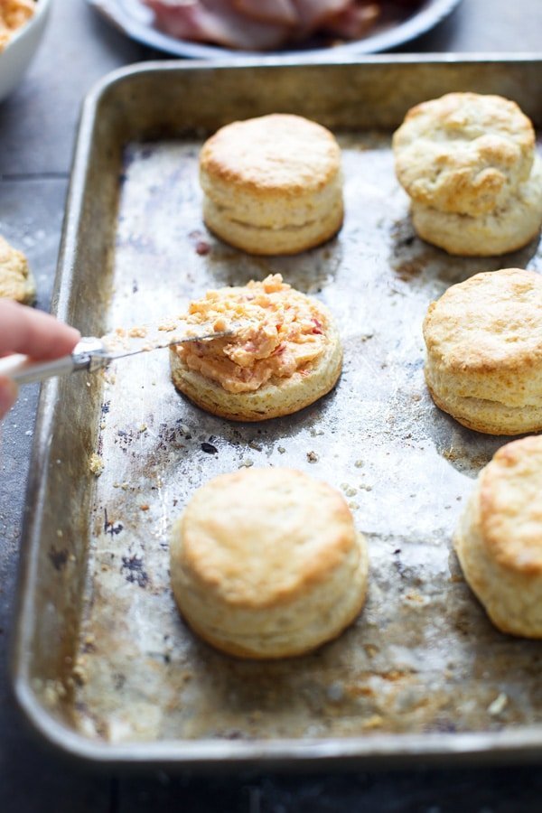 These Ham &amp; Pimento Cheese Sandwiches are simple, but bursting with flavor. We take our favorite biscuit recipe that's light, flaky, and oh-so delicious and smother the inside with warm pimento cheese and ham. The perfect bridal shower, lunch or side to soup or salad.