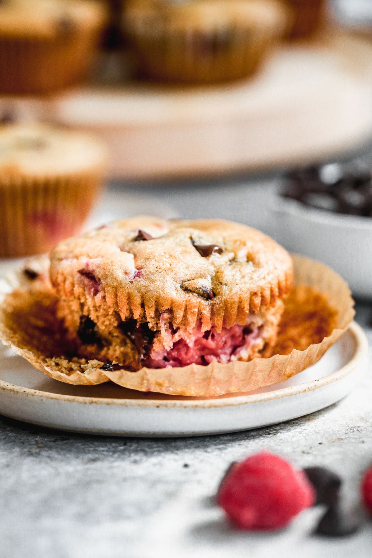 These one bowl Chocolate Raspberry Muffins are light, fluffy and full of gooey chocolate raspberry flavor. Made with protein-packed Greek yogurt, coconut oil and whole-wheat flour, they also have a good dose of healthiness so you don't have to feel completely guilty indulging. &nbsp;Perfect way to kickstart your day or nestle in a sweet pick-me-up in the afternoon.&nbsp;