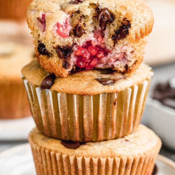 These one bowl Chocolate Raspberry Muffins are light, fluffy and full of gooey chocolate raspberry flavor. Made with protein-packed Greek yogurt, coconut oil and whole-wheat flour, they also have a good dose of healthiness so you don't have to feel completely guilty indulging.  Perfect way to kickstart your day or nestle in a sweet pick-me-up in the afternoon. 