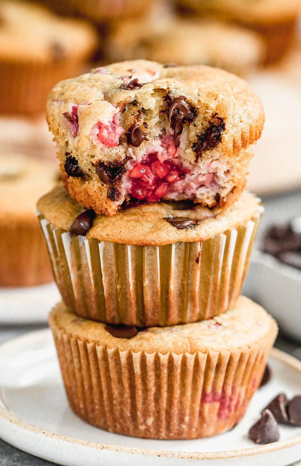 These one bowl Chocolate Raspberry Muffins are light, fluffy and full of gooey chocolate raspberry flavor. Made with protein-packed Greek yogurt, coconut oil and whole-wheat flour, they also have a good dose of healthiness so you don't have to feel completely guilty indulging. &nbsp;Perfect way to kickstart your day or nestle in a sweet pick-me-up in the afternoon.&nbsp;