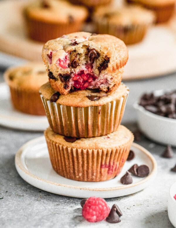These one bowl Chocolate Raspberry Muffins are light, fluffy and full of gooey chocolate raspberry flavor. Made with protein-packed Greek yogurt, coconut oil and whole-wheat flour, they also have a good dose of healthiness so you don't have to feel completely guilty indulging.  Perfect way to kickstart your day or nestle in a sweet pick-me-up in the afternoon. 