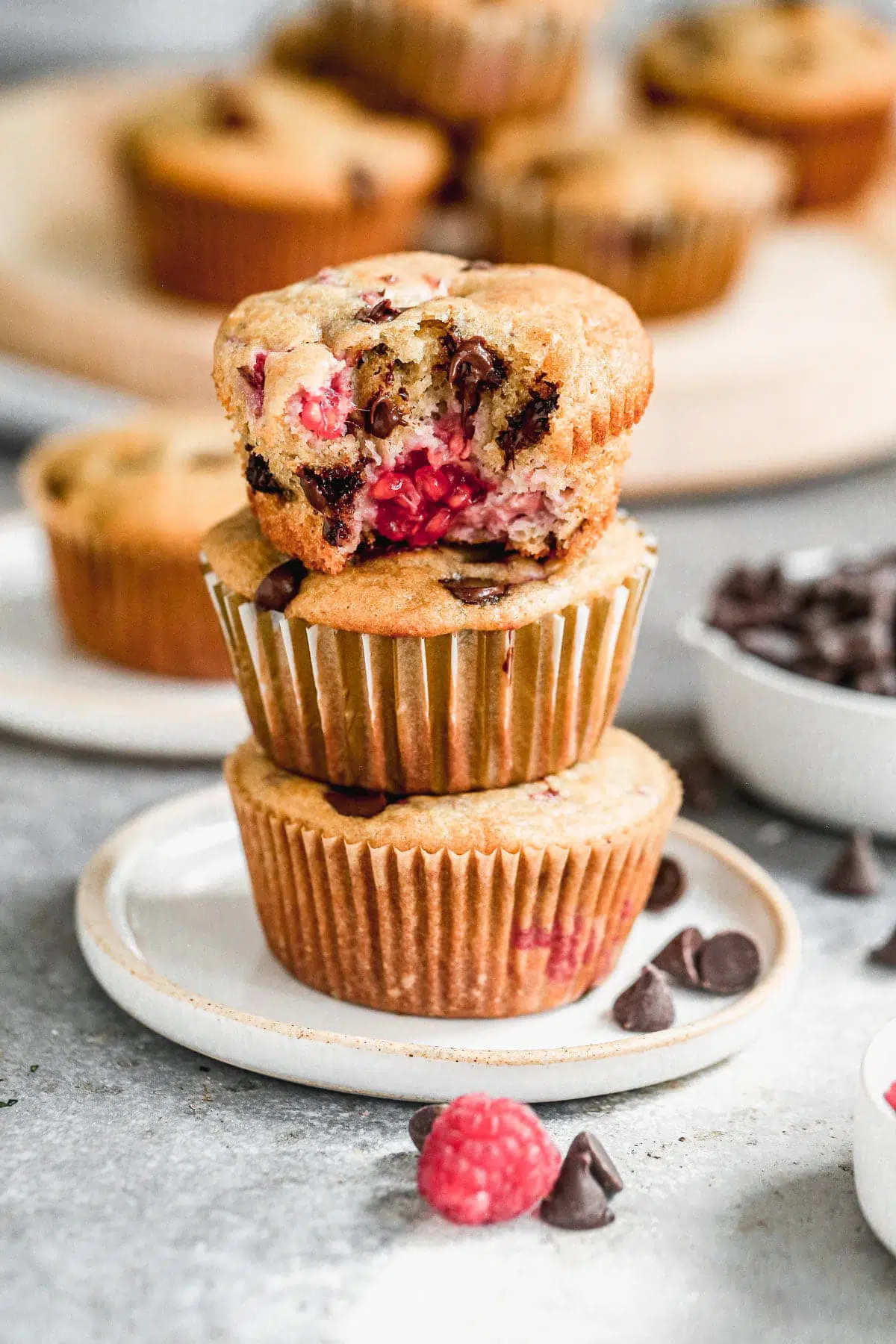 These one bowl Chocolate Raspberry Muffins are light, fluffy and full of gooey chocolate raspberry flavor. Made with protein-packed Greek yogurt, coconut oil and whole-wheat flour, they also have a good dose of healthiness so you don't have to feel completely guilty indulging. &nbsp;Perfect way to kickstart your day or nestle in a sweet pick-me-up in the afternoon.&nbsp;