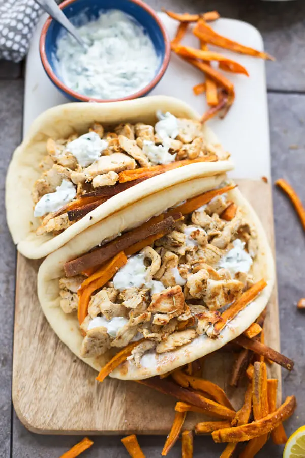 Chicken gyros serves with sweet potato fries