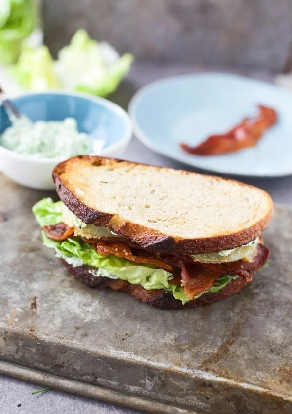 An update on a classic BLT with fried green tomatoes, bacon and herbed goat cheese