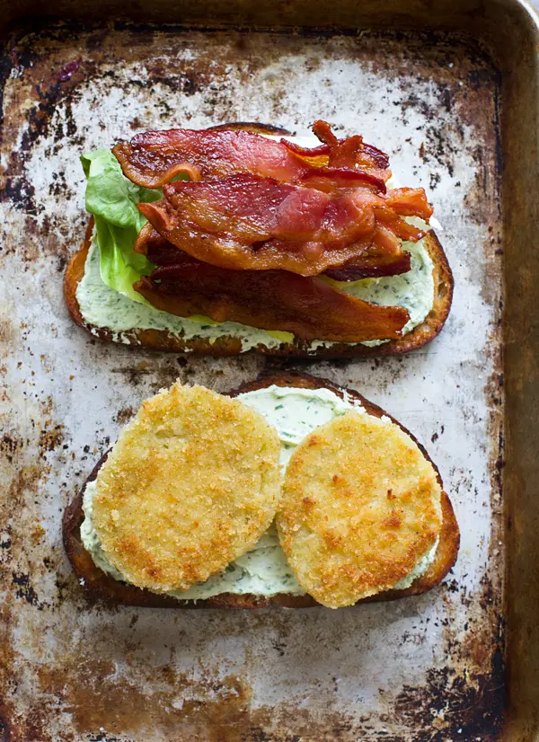 Fried green tomatoes, bacon and herbed goat cheese on sourdough bread