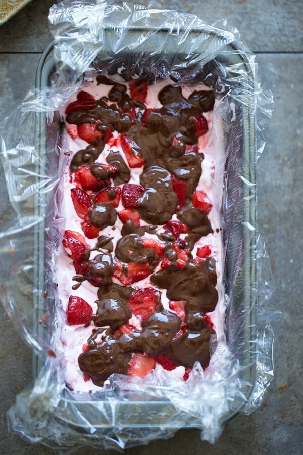 Chocolate fudge with roasted strawberries and strawberry ice cream