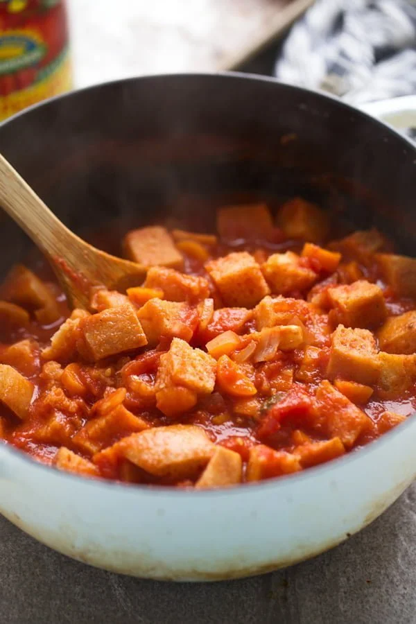 Add dried bread to tomato soup mixture