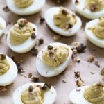 Brown Butter Deviled Eggs with Crispy Capers and Hazelnuts