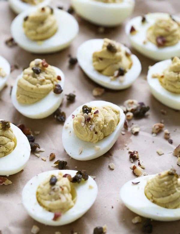 Brown Butter Deviled Eggs with Crispy Capers and Hazelnuts