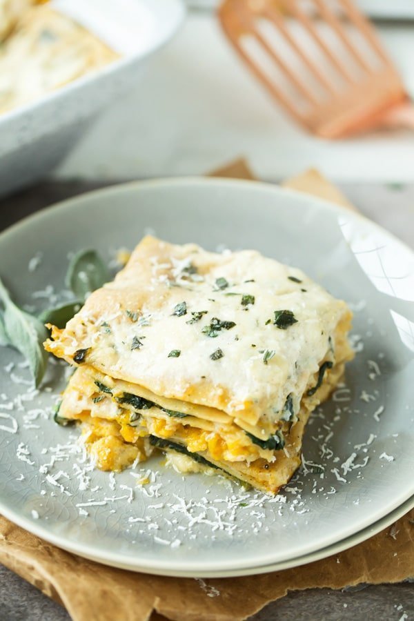 Butternut Squash & Spinach Lasagna: Creamy layers of brown butter béchamel, creamy squash, nutty parmesan cheese and tender pasta! 