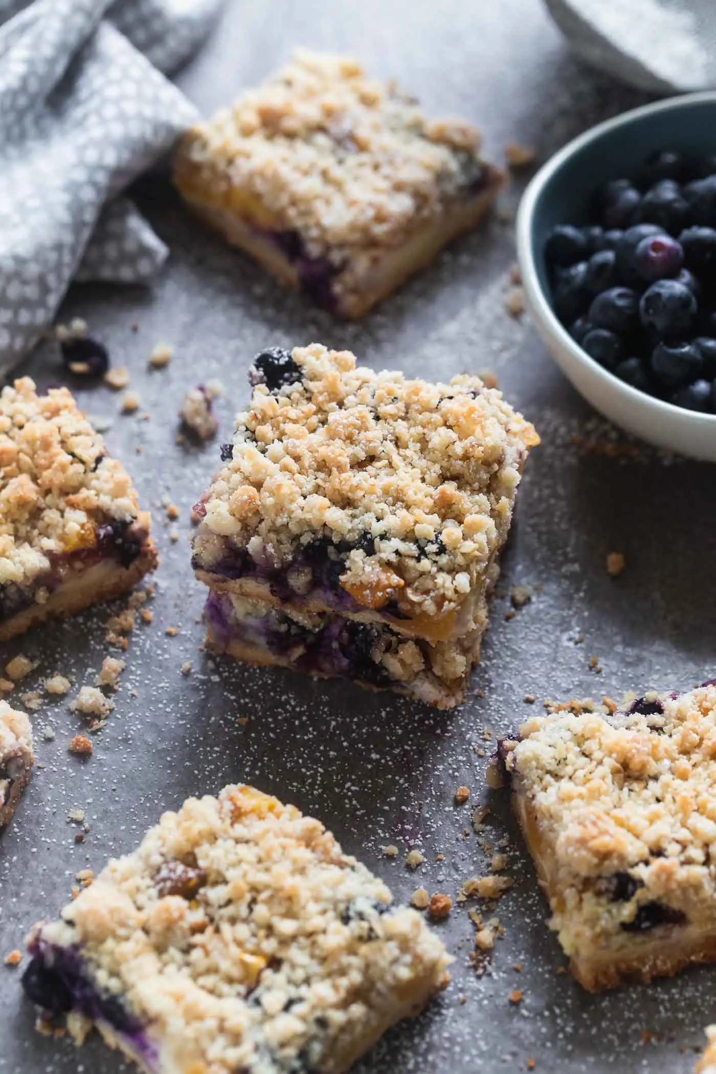 Blueberry Peach Cheesecake Crumble Bars
