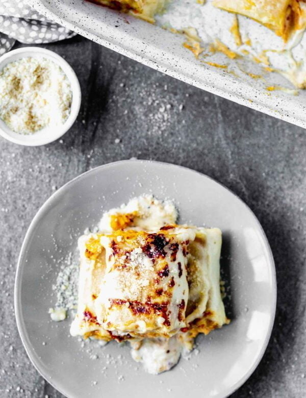 Butternut Squash Lasagna Rolls are cozy, rich and oh-so delicious. With only six ingredients, they're a cinch to throw together, and sure to impress a crowd.