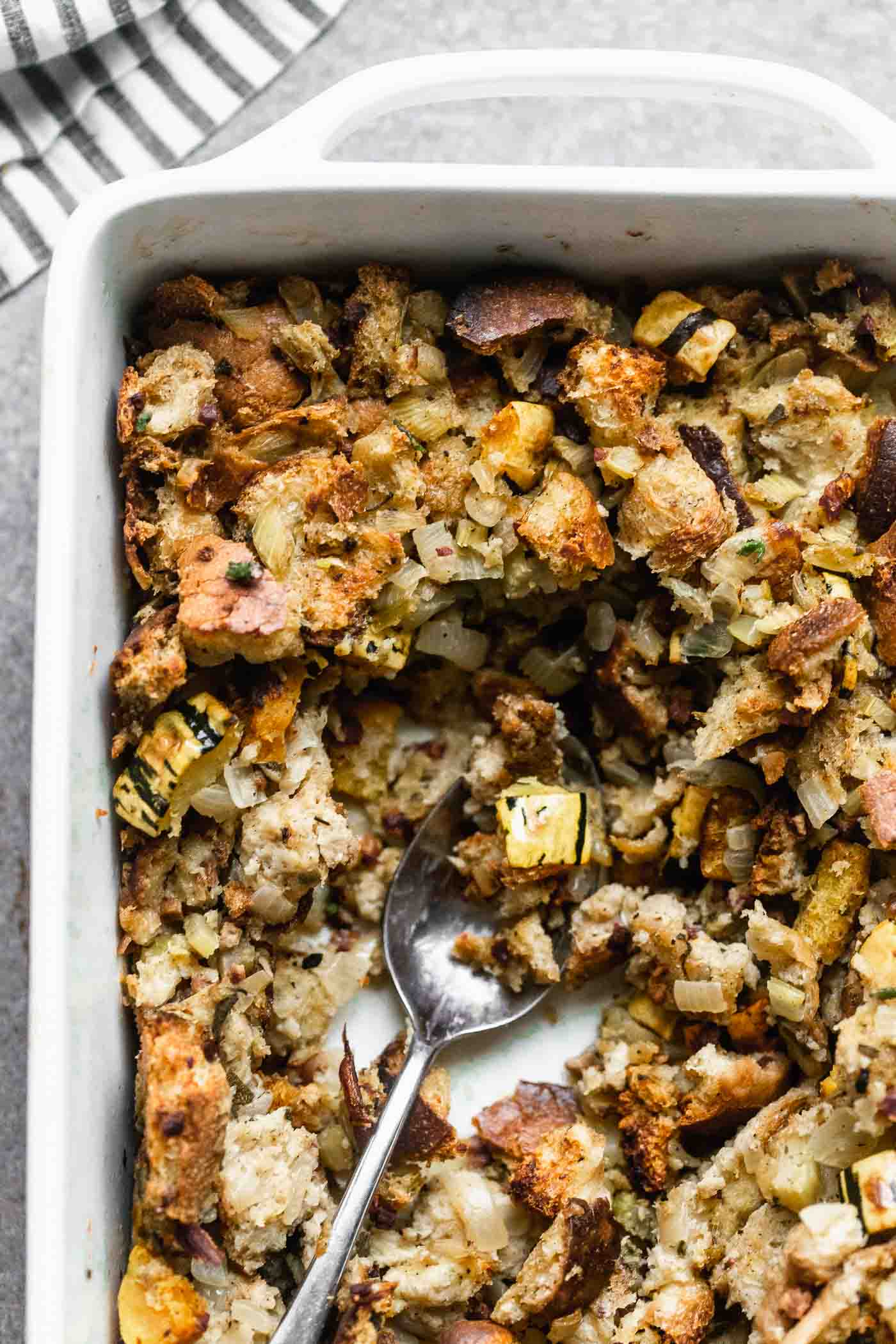 Delicata Squash, Sage and Pancetta Stuffing is a classic stuffing, updated. It has the flavor of the original with the addition of sweet squash, salty pancetta and nutty brown butter. A crowd pleaser for sure! 