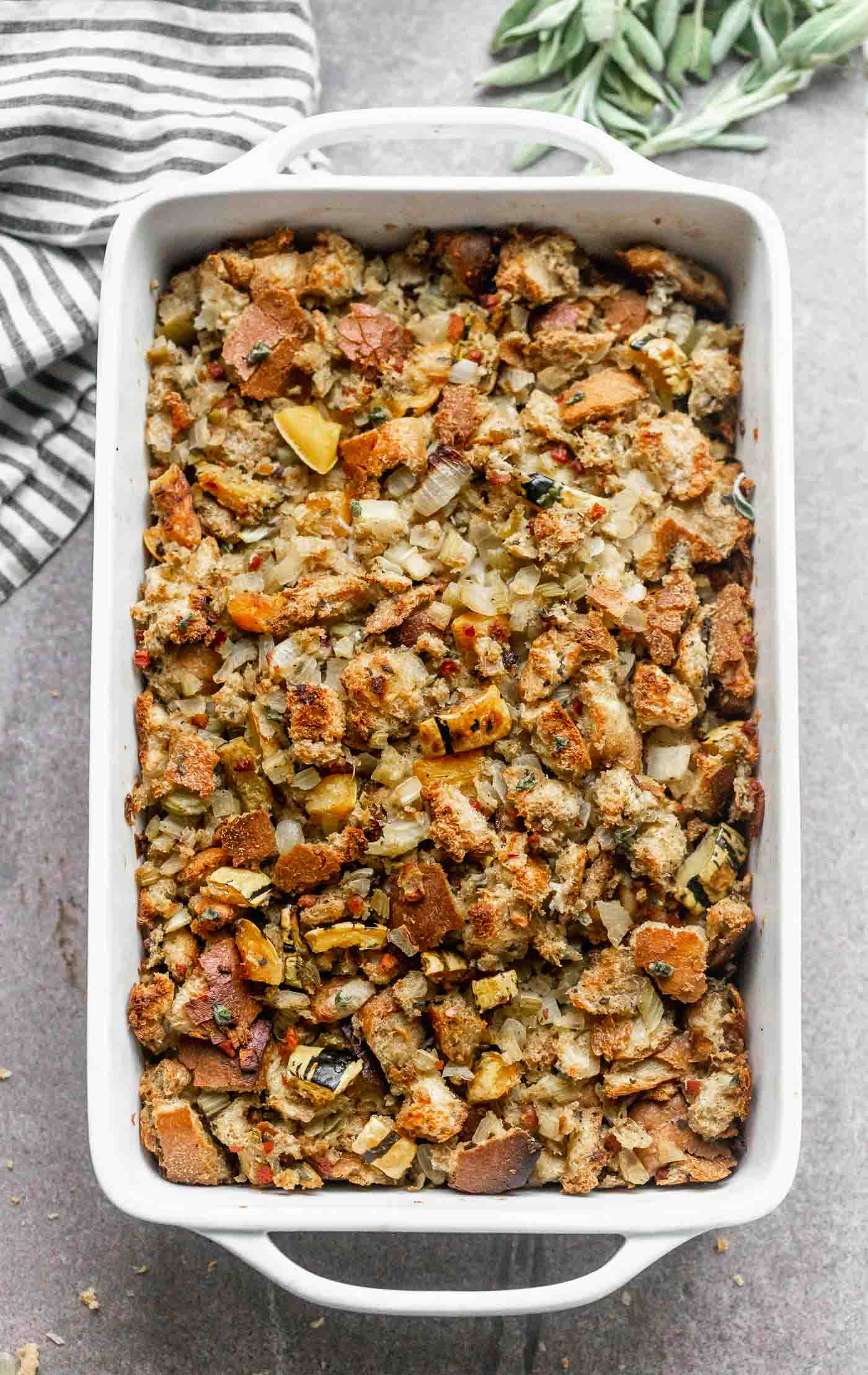 Delicata Squash, Sage and Pancetta Stuffing is a classic stuffing, updated. It has the flavor of the original with the addition of sweet squash, salty pancetta and nutty brown butter. A crowd pleaser for sure! 