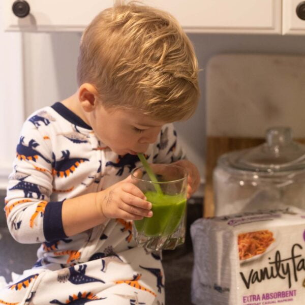 Vanity Fair® Napkins and Our Favorite Green Smoothie made with frozen mango, pineapples, banana, flax seed, TONS of spinach and unsweetened almond milk