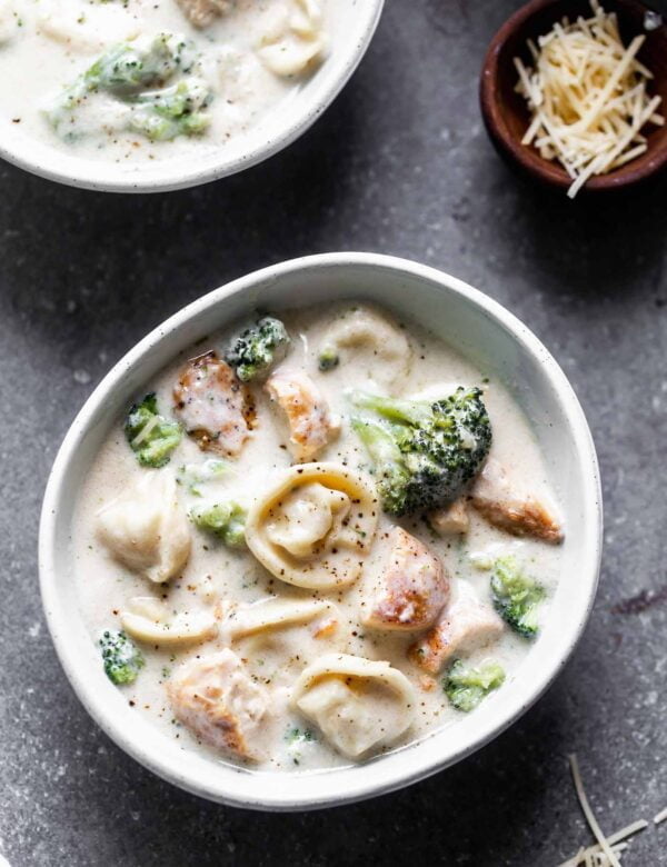 This Easy Chicken Broccoli Alfredo Soup is a one-pot meal perfect for a cold winter night. It’s packed with tender broccoli, a parmesan-laced cream sauce, seared chicken, and cheesy tortellini. Creamy and comforting!